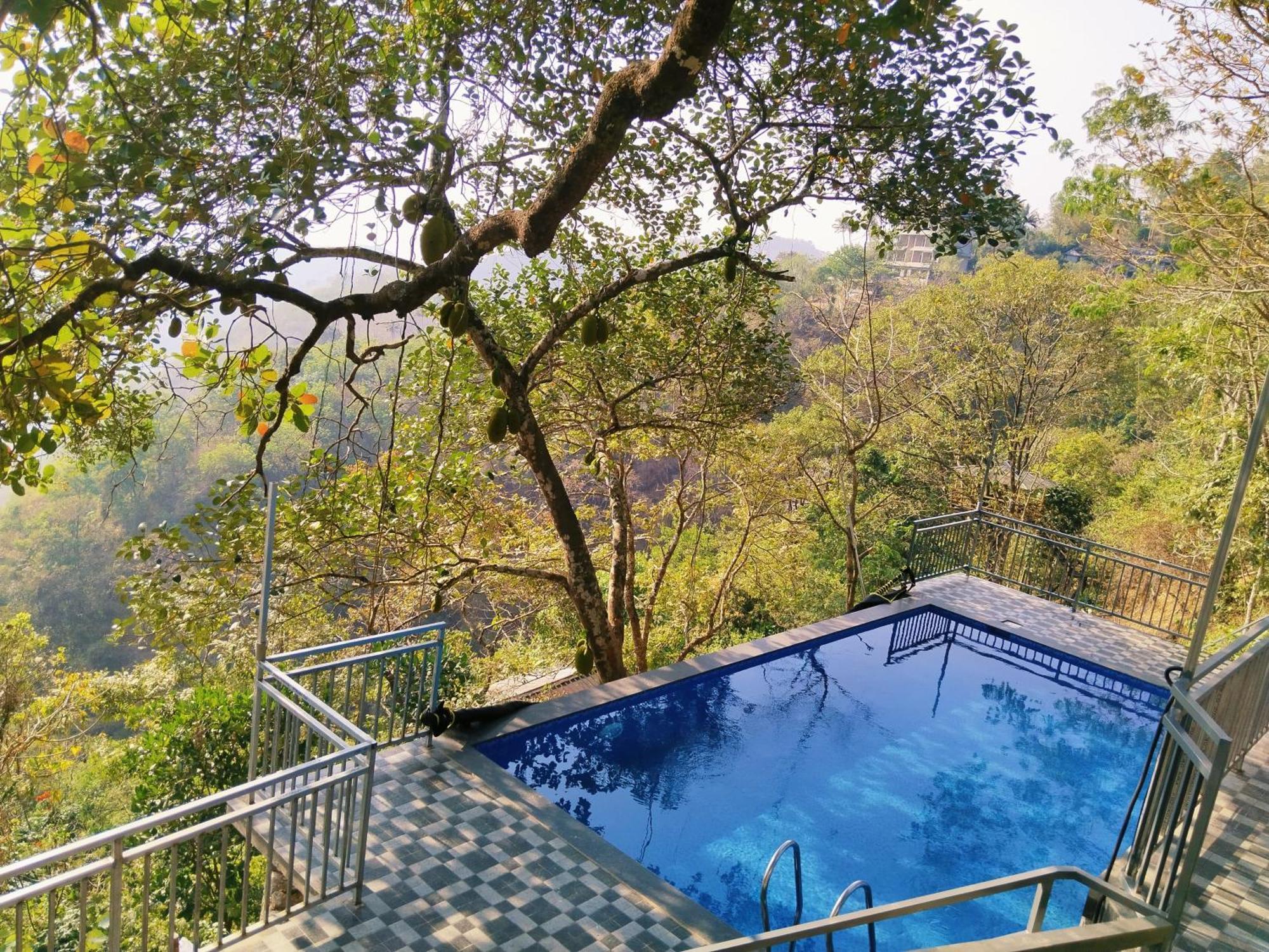 Pīrmed Sunset Valley Kerala Pool Resort - Serene Natural Forest Cottage Stay In Idukki With Sunrise & Sunset Panoramas, Natural Streams & Tranquil Summer Evenings מראה חיצוני תמונה