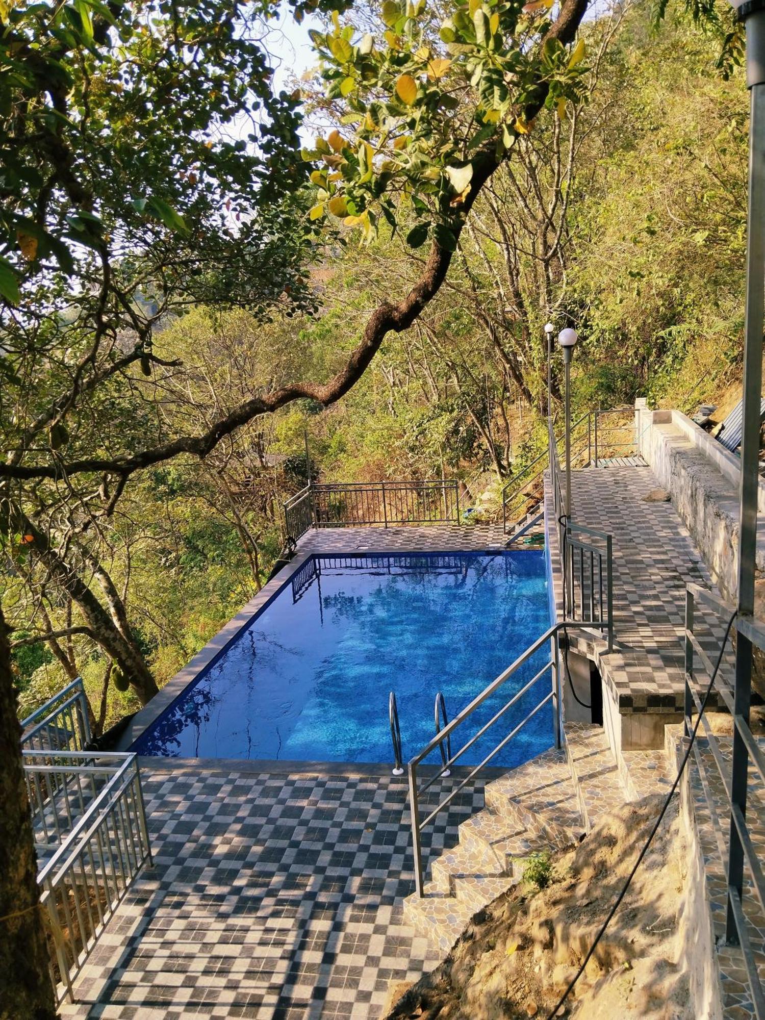 Pīrmed Sunset Valley Kerala Pool Resort - Serene Natural Forest Cottage Stay In Idukki With Sunrise & Sunset Panoramas, Natural Streams & Tranquil Summer Evenings מראה חיצוני תמונה